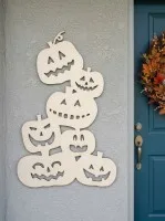 Déco murale Halloween pile de citrouilles – six citrouilles sculptées 60 cm