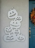 Déco murale Halloween pile de citrouilles – six citrouilles sculptées 60 cm