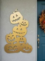 Déco murale Halloween pile de citrouilles – six citrouilles sculptées 60 cm